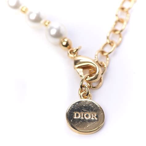 gold dior necklace with pearl